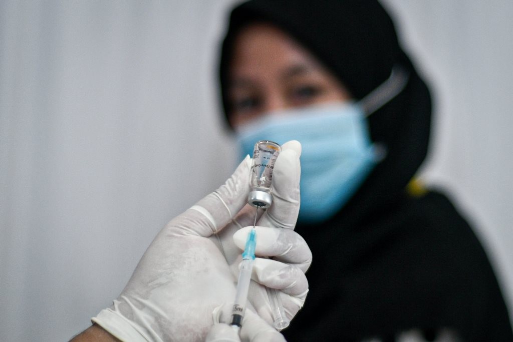 Ilustrasi penyuntikan vaksin covid-19 - - Foto: MI/ Andri Widiyanto